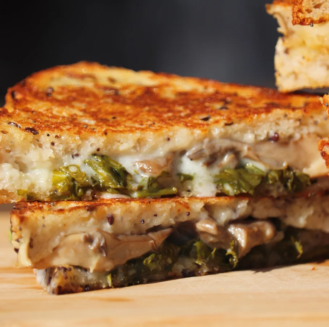 Oyster mushroom confit served on toasted sourdough bread.