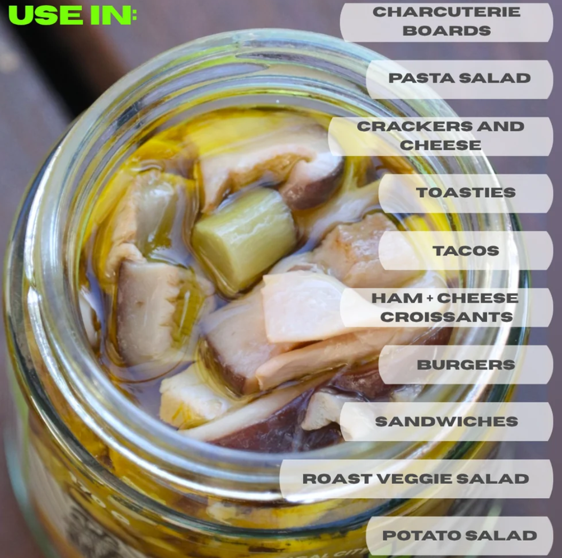 Open jar of Sott’olio Funghi Pickle showing the marinated mushrooms.